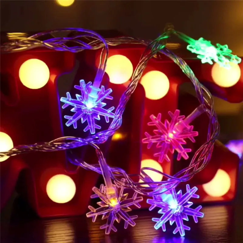 Snowflake string light garlands with PVC lights and remote control in warm white colour for Christmas tree decoration