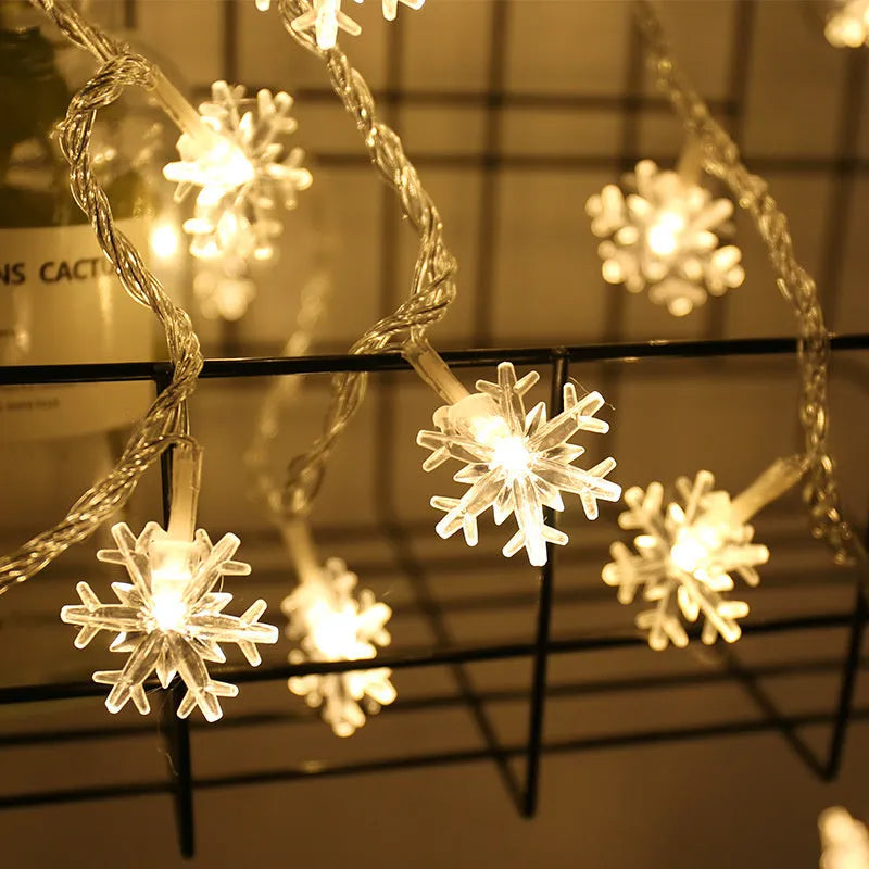 Snowflake string light garlands with PVC lights and remote control in warm white colour for Christmas tree decoration