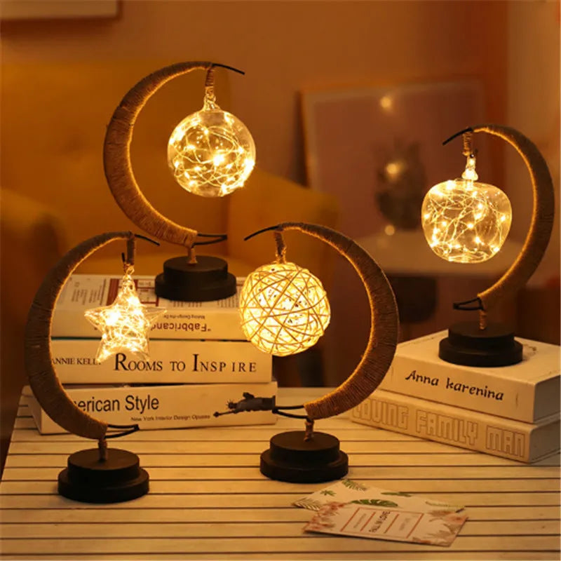Warm white dimmable LED modelling light in apple shape with 10 beads on a wooden table