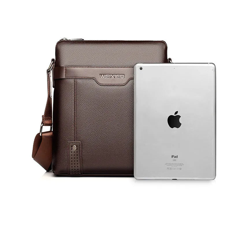 A black men's casual shoulder bag made from soft PU leather with a square shape and single strap.