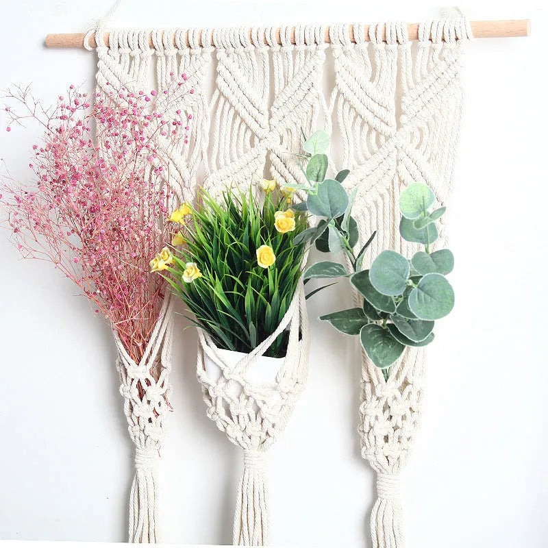 White hand-woven cotton rectangle tapestry 50x65cm with beech rod hung on wall showing grid pattern