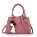Ladies PU leather handbag 28cm x 12cm x 19cm with zip closure and 14cm handle, shown in available colours