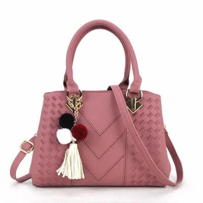 Ladies PU leather handbag 28cm x 12cm x 19cm with zip closure and 14cm handle, shown in available colours