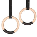 Birch wood gymnastic rings with nylon straps for calisthenics training