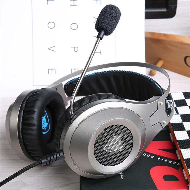 Black wired USB gaming headset with microphone for PC computers, showing over-ear design and straight plug