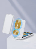 Black foldable wireless charger showing three devices charging simultaneously