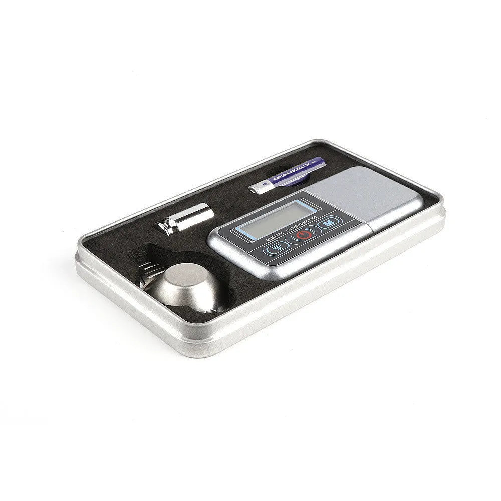 Digital electronic precision scale with display, for weighing jewellery and medicinal materials up to 100g.