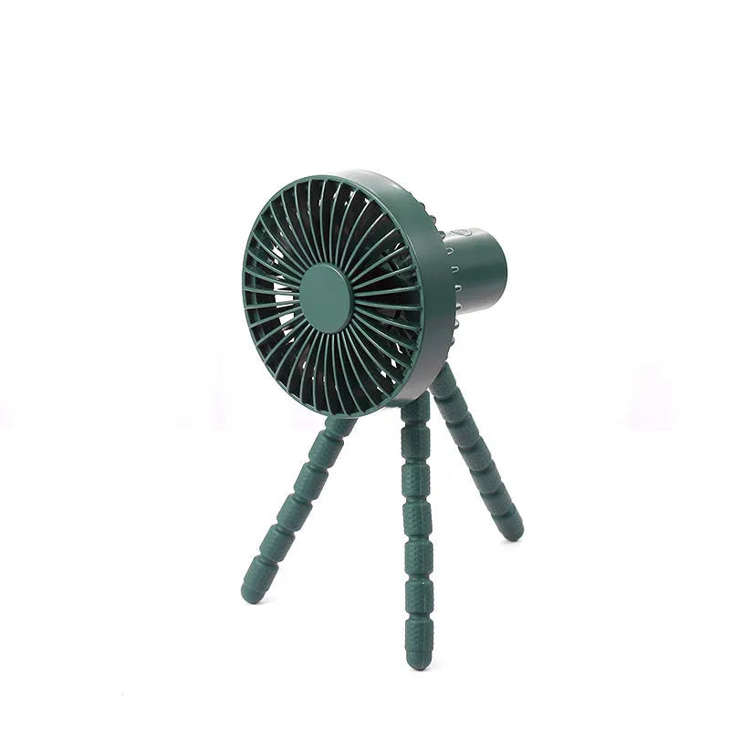 USB-powered portable desk fan with flexible tripod legs and a removable front cover, shown in white.