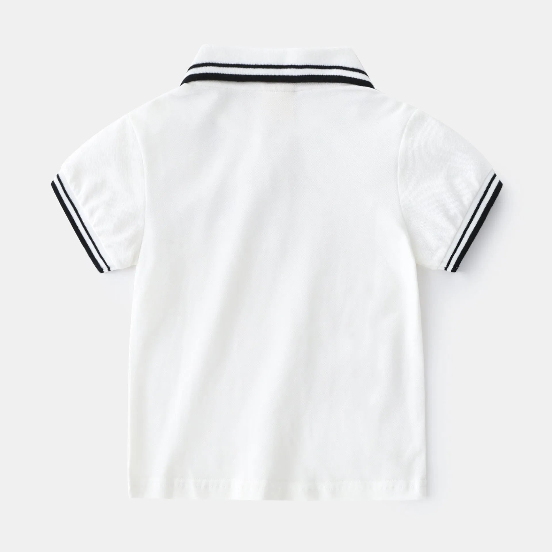 Boys' plain white and black short-sleeve cotton polo shirts for summer.