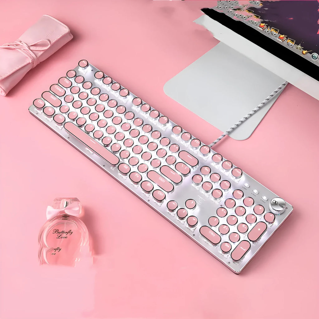 Queen Lipstick mechanical keyboard with silver base, pink key accents, and white backlighting on keys.