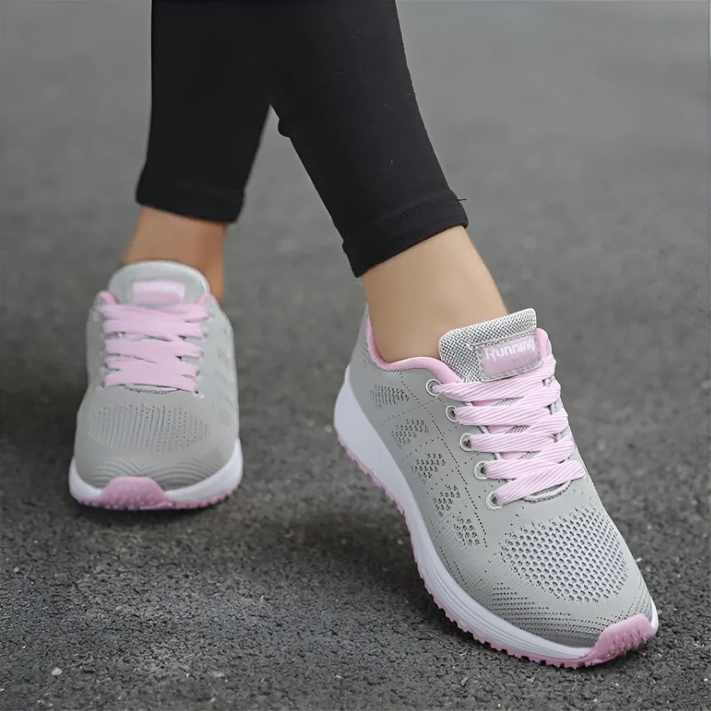 Women's breathable sneakers with low heel, cross straps, non-slip plastic sole, and colour matching pattern.