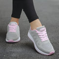 Women's breathable sneakers with low heel, cross straps, non-slip plastic sole, and colour matching pattern.