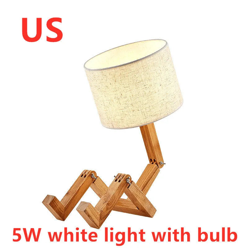 Creative humanoid wooden table lamp with white fabric shade measuring 22x44x16cm