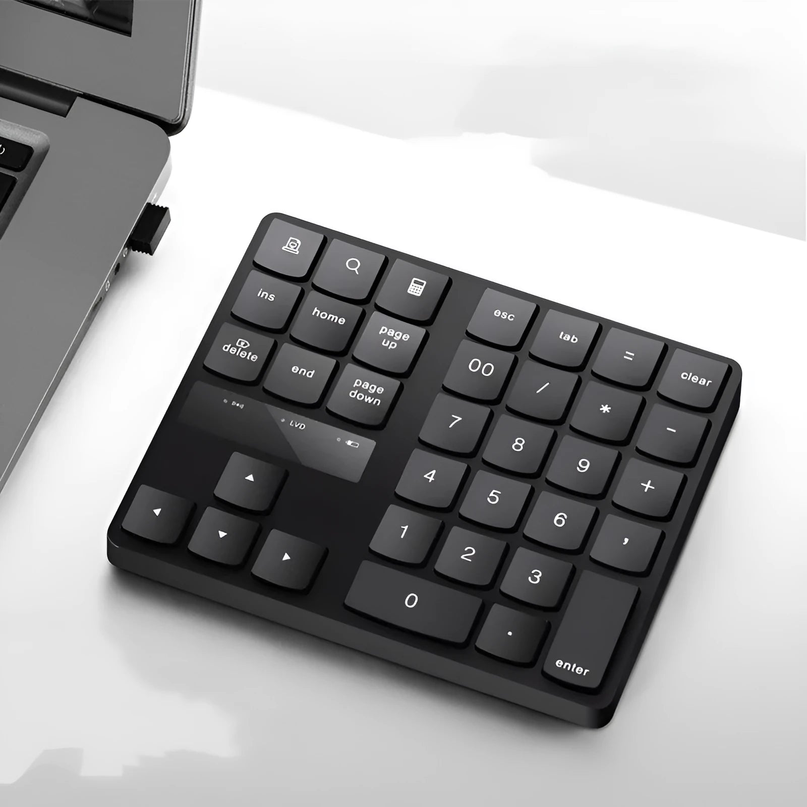 Black wireless numeric keyboard with 35 keys, ABS construction, 145x120x19mm dimensions, USB charging cable and receiver visible
