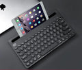 Wireless Bluetooth keyboard in pink or black with optional matching mouse and storage bag