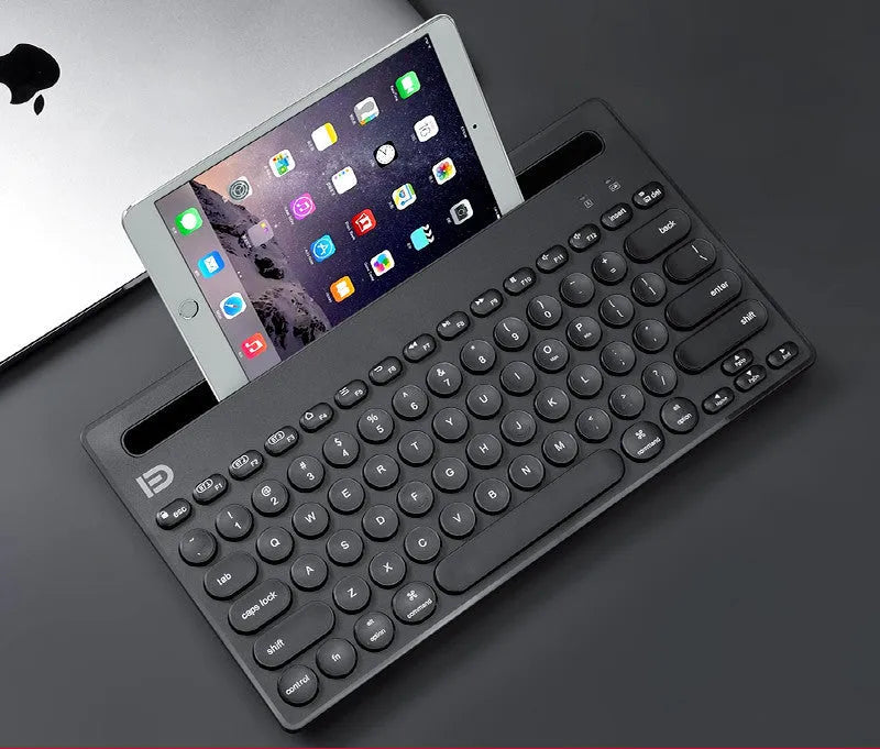 Wireless Bluetooth keyboard in pink or black with optional matching mouse and storage bag