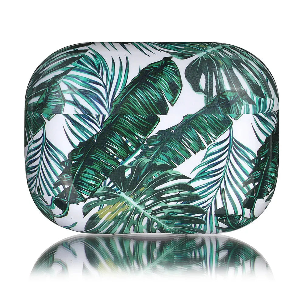 Blue TPU AirPods case with painted tropical banana leaf design, shown next to a green variant.