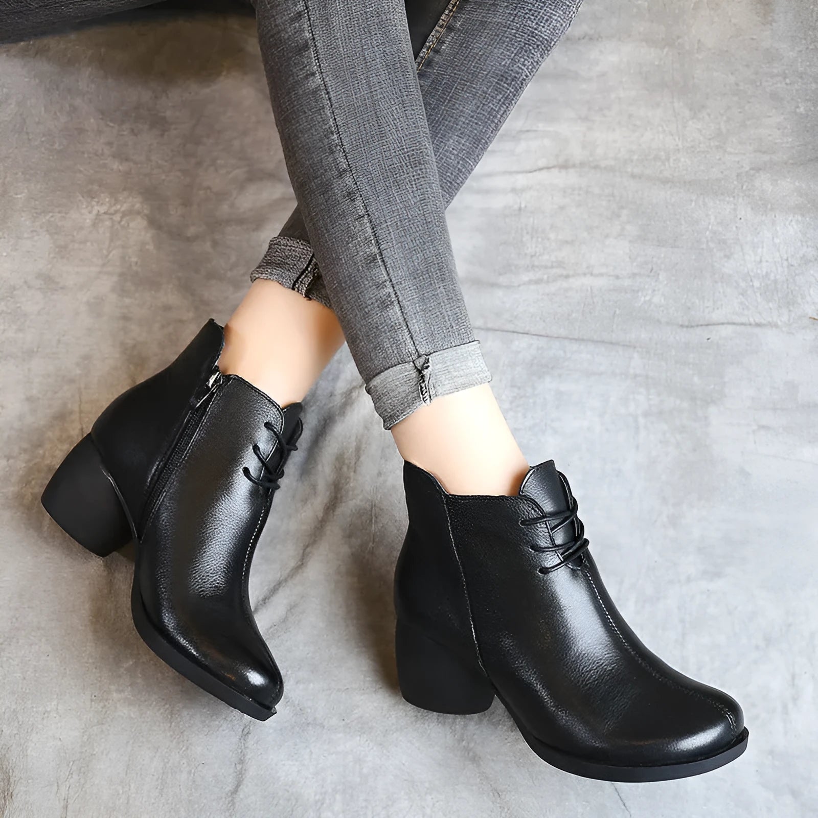 Women's black vintage-style leather Martin boots with thick rubber sole and round toe
