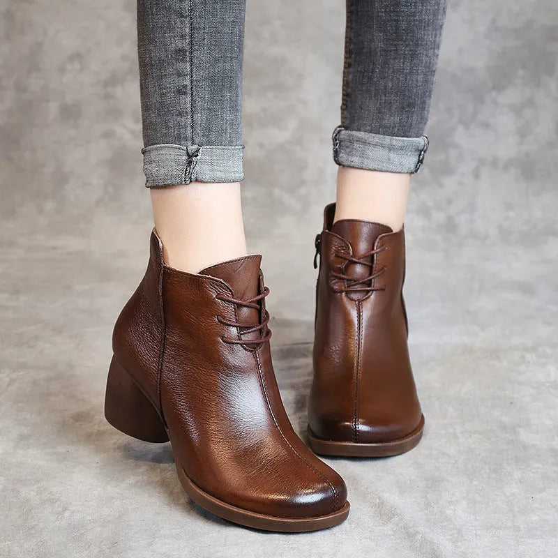 Women's black vintage-style leather Martin boots with thick rubber sole and round toe