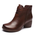 Women's black vintage-style leather Martin boots with thick rubber sole and round toe