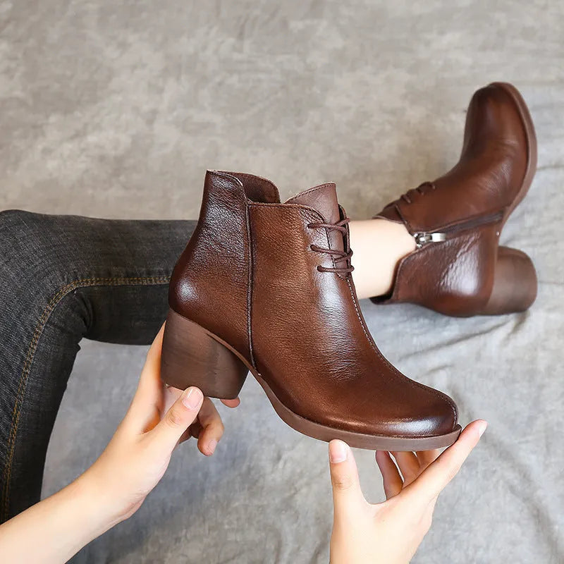 Women's black vintage-style leather Martin boots with thick rubber sole and round toe