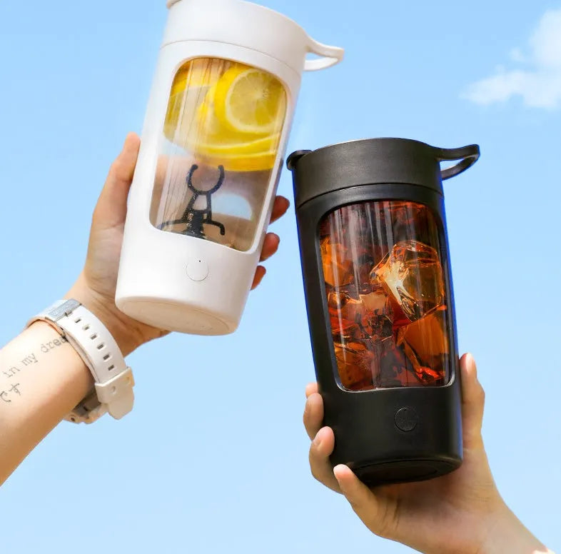Portable battery-powered juice blender with 650ml mixing cup in black, blue, pink, or white colour.