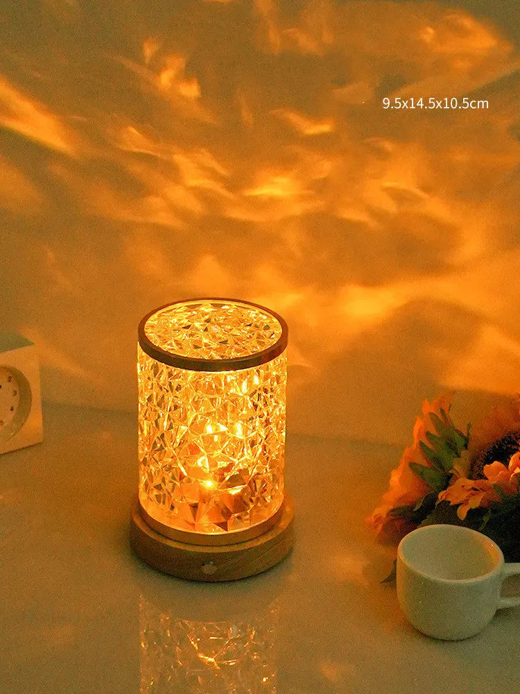 Rotating water ripple night light on solid wood base with USB charging cable
