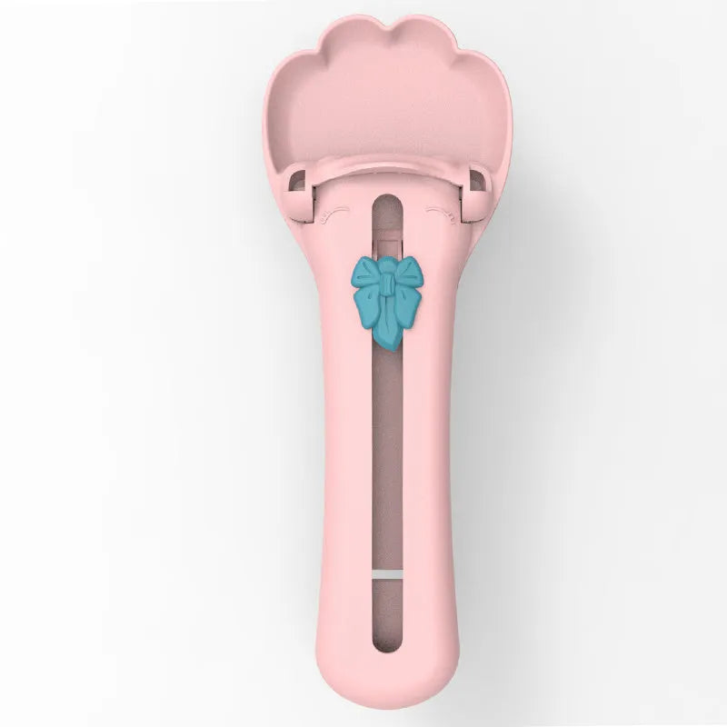 Pet feed spoon squeezer with food scoop design in green and pink two-tone colour options