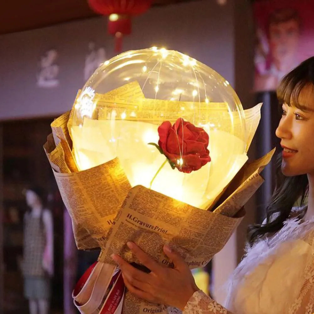 Transparent LED luminous balloon with artificial rose inside glowing with built-in light