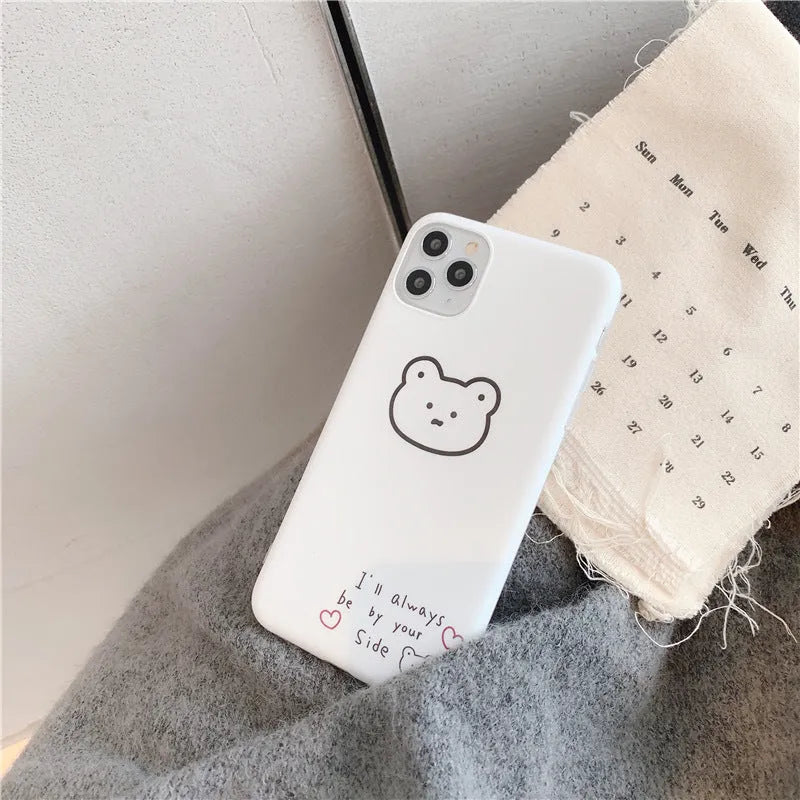 Silicone iPhone case with Korean bear cartoon design showing back and side coverage