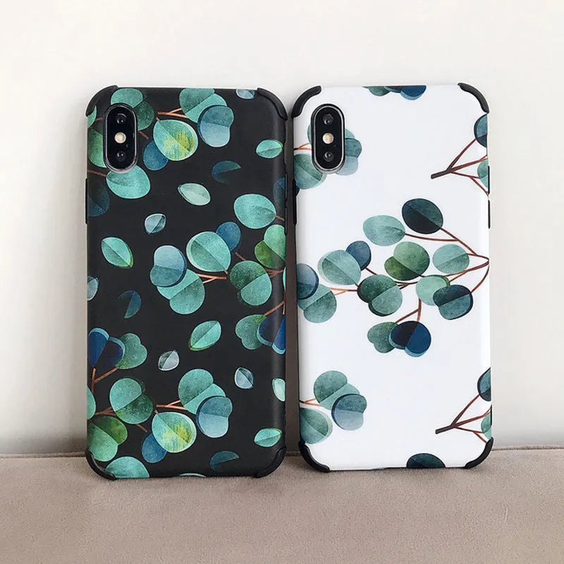 Black silicone iPhone case featuring a raised leaf pattern design on the back.