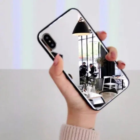 Black mirror phone case for iPhone, showing the reflective surface on the back cover.