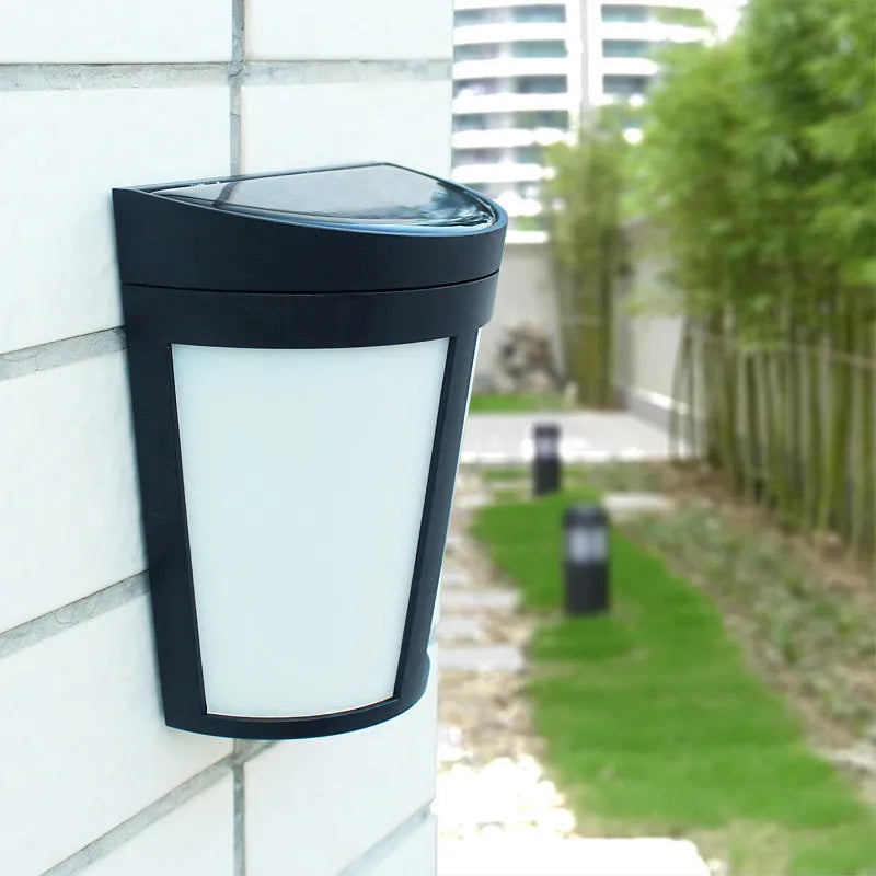 Solar-powered outdoor wall lamp with 6 LEDs and automatic sensor for garden pathway lighting