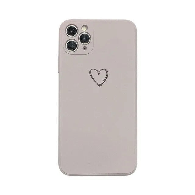 A solid colour silicone phone case for Apple iPhone on a table, showing its slim TPU back cover design.