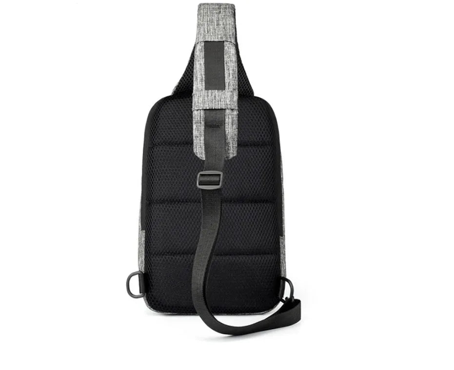 Dark blue waterproof oxford chest bag with adjustable strap, showing front zipper and compact square shape.