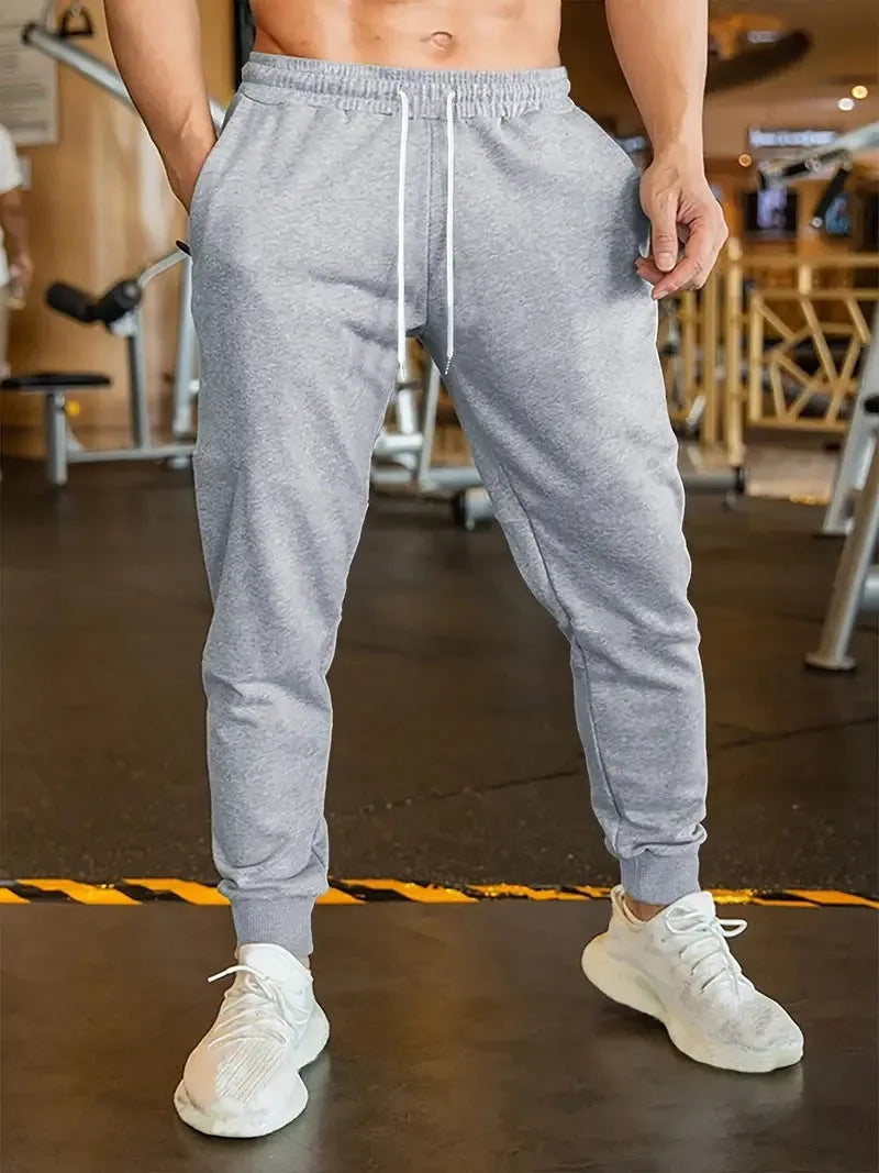 Men's loose fit linen leisure trousers with elastic drawstring waist in a casual style