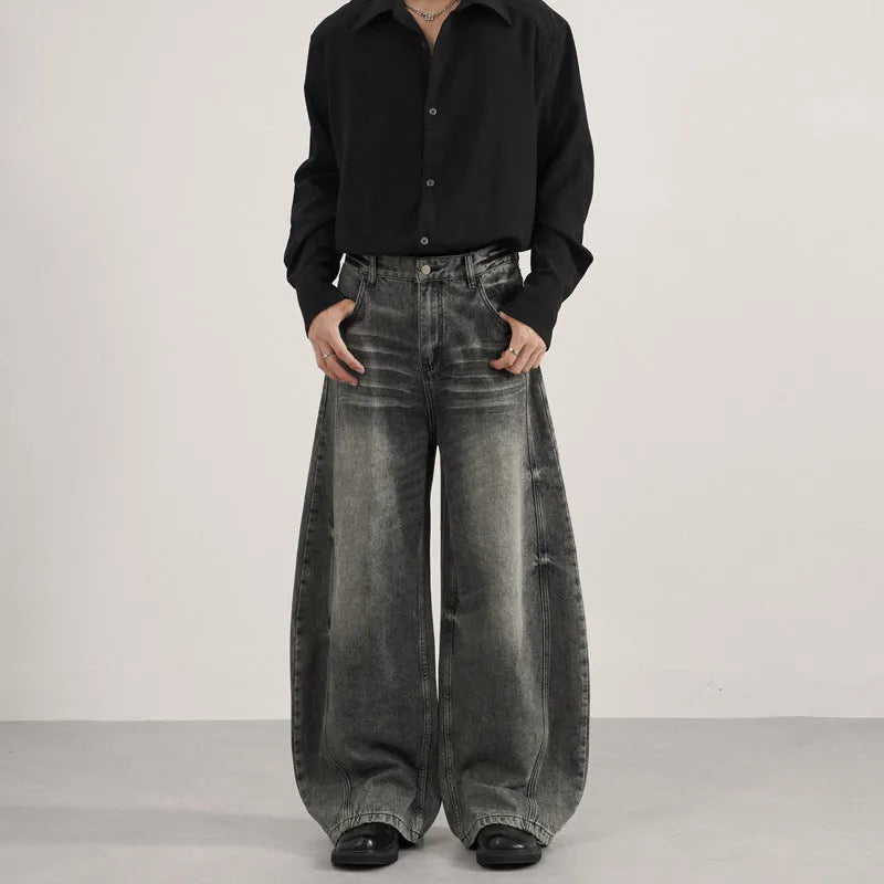 Men's denim straight leg jeans in black and gray washed finish with zip fly