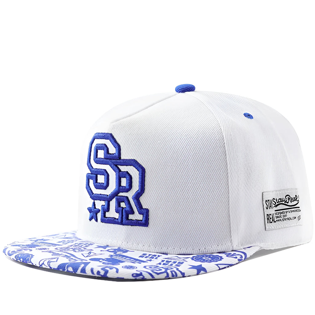 White and black adjustable cotton baseball cap with embroidered letters on the front, showing dome crown and adjustable strap.