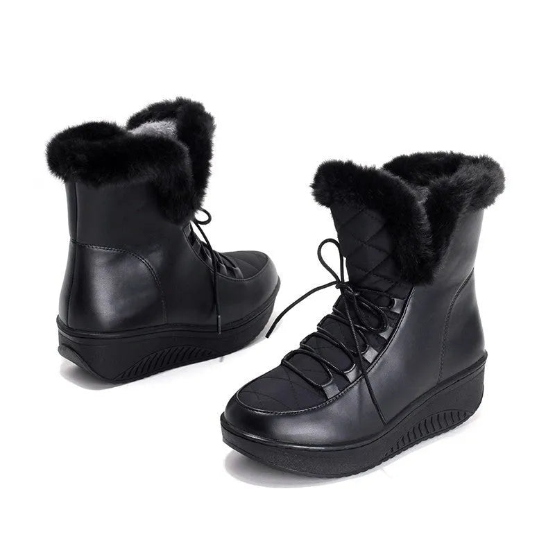 Black women's winter lace-up boots with a platform sole and plush lining.