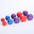 Colourful plastic fitness dumbbells in 0.5kg, 1kg, and 1.5kg weights with glossy surface