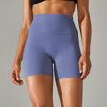Women's high waist fitness tights in dark green colour with belly contracting design and hip lift construction