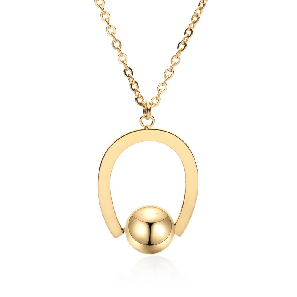 Gold and silver stainless steel necklace with geometric pendant on a cross chain, adjustable length.