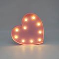 3D love heart marquee letter lamp in pink or red, 26.5cm x 4.0cm x 27.5cm, warm white LEDs, indoor wall or freestanding decoration