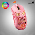Free Wolf X2 wireless gaming mouse in black on a mouse mat, showing RGB lighting and side thumb buttons.