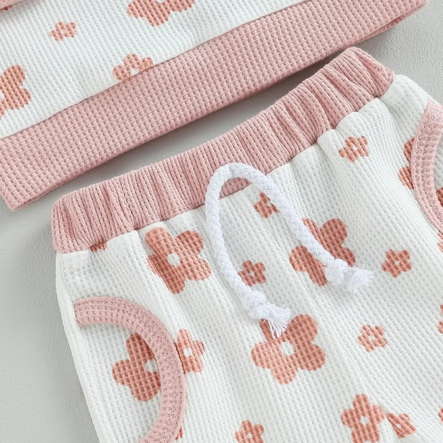 Children's cotton flower print sweater suit set with top and trousers in beige, camel, white, and milky white colours