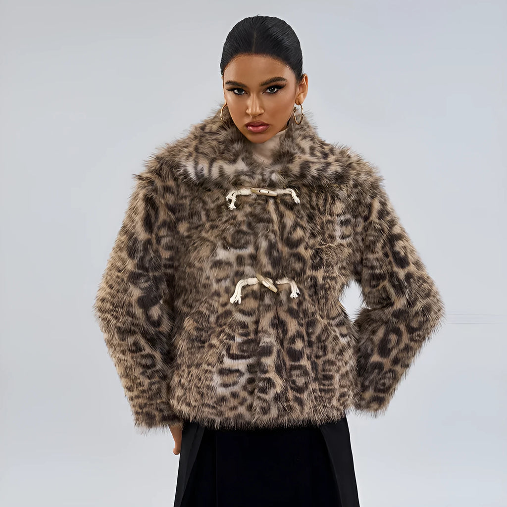 Women's leopard print polyester coat with a buckle lapel closure on a hanger