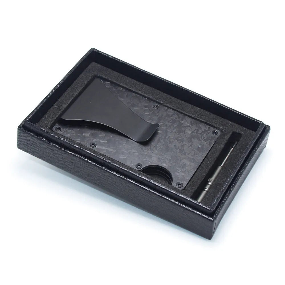 Geometric aluminium and carbon fibre card holder in multiple colours on a table, showing slim 8mm profile.