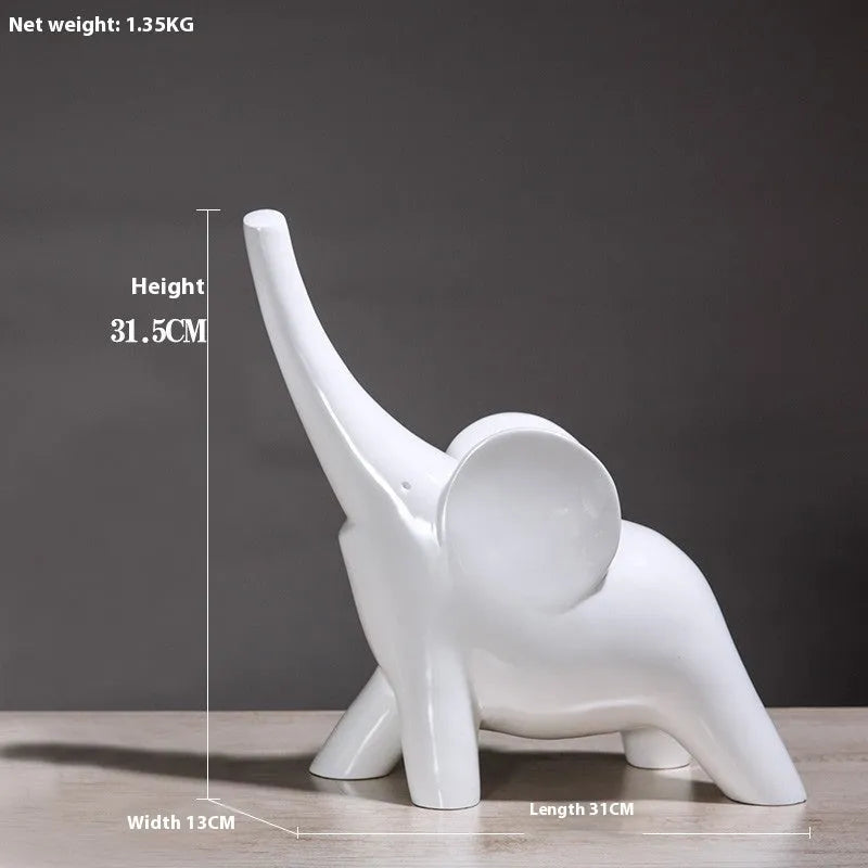 Modern minimalist resin elephant ornament in rose gold or white colour, available in large and small sizes.