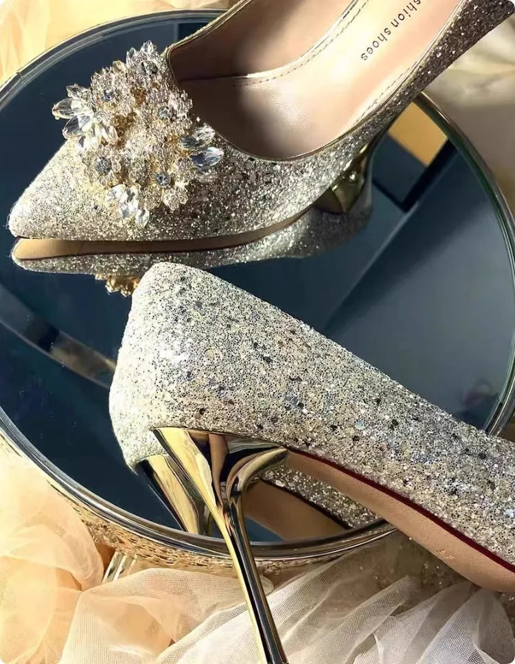 Champagne coloured pointed toe bridal shoes with rhinestone flower pattern and fine heel.