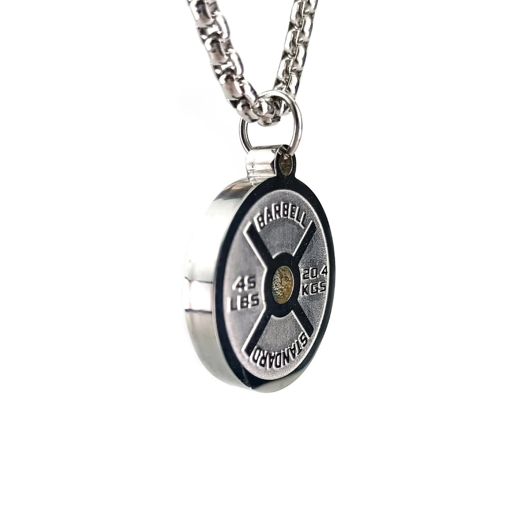 Stainless steel geometric barbell disk necklace on a 60cm chain, showing polished pendant detail.